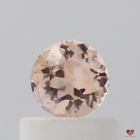 0.47cts Round Warm Peach Sapphire