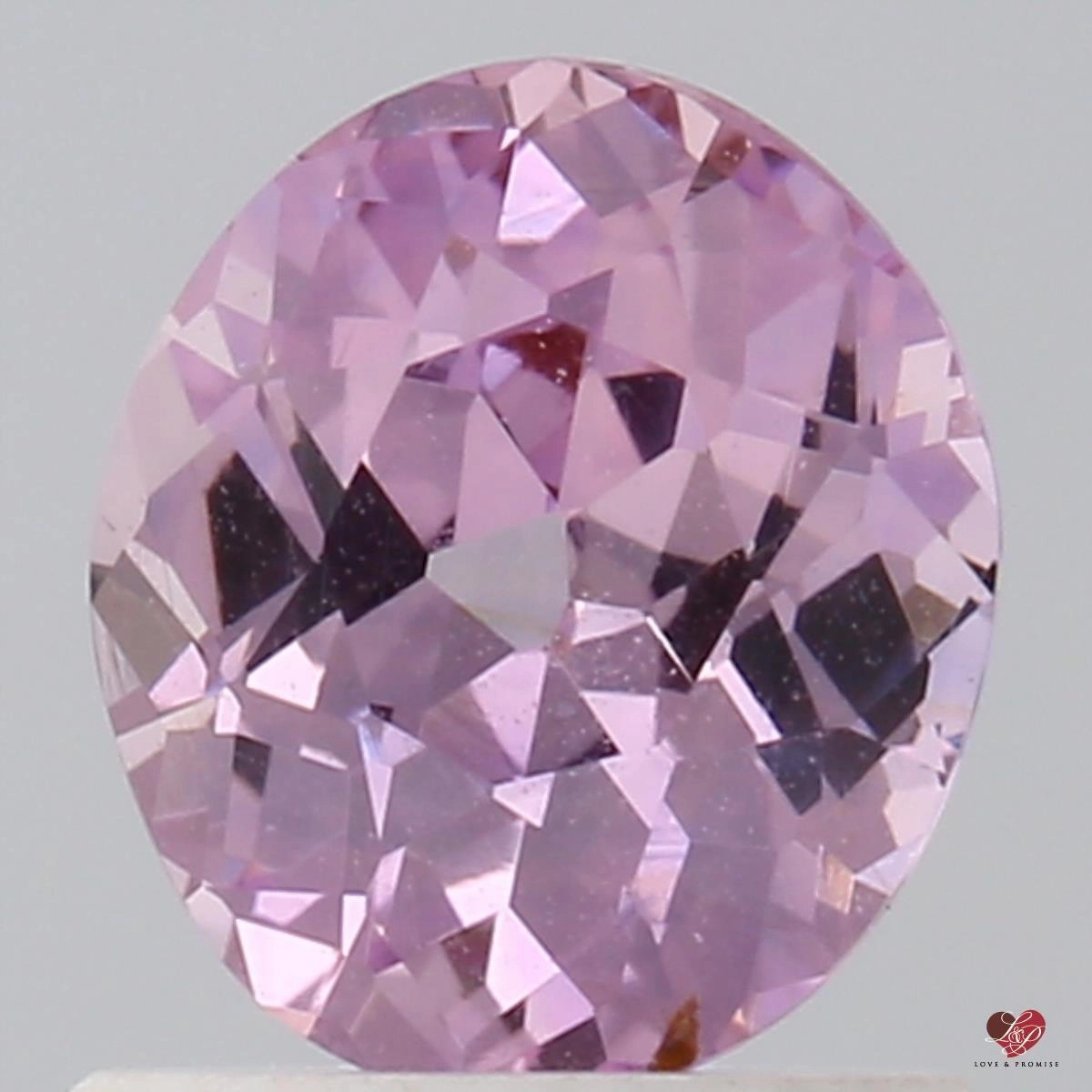 1.06cts Oval Peach Champagne Rose Sapphire
