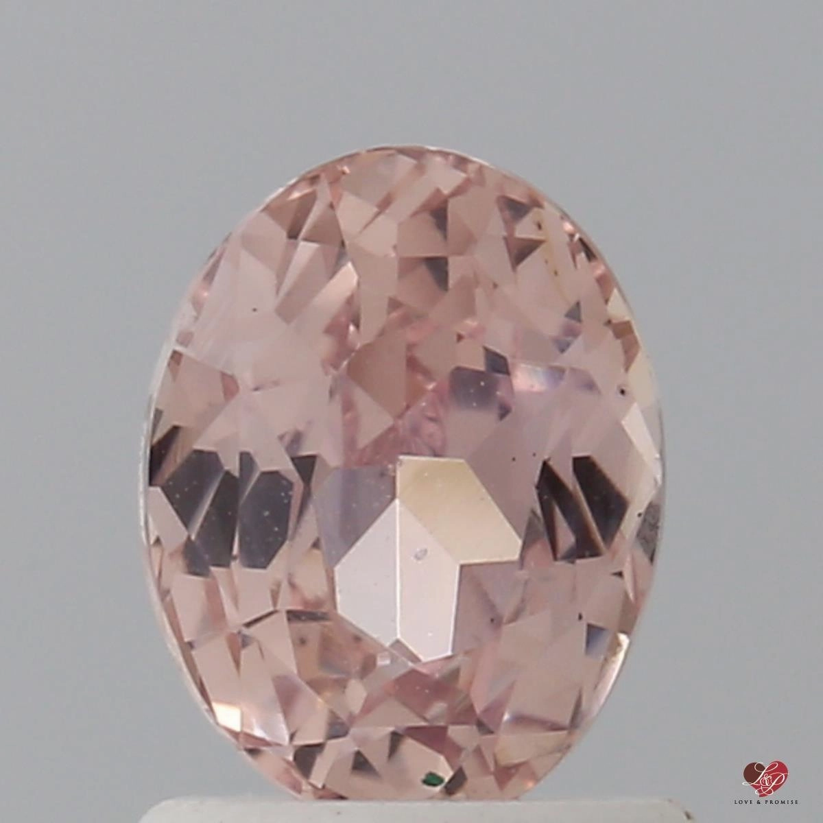 1.48cts Oval Medium Vivid Peach Blush Champagne Sapphire